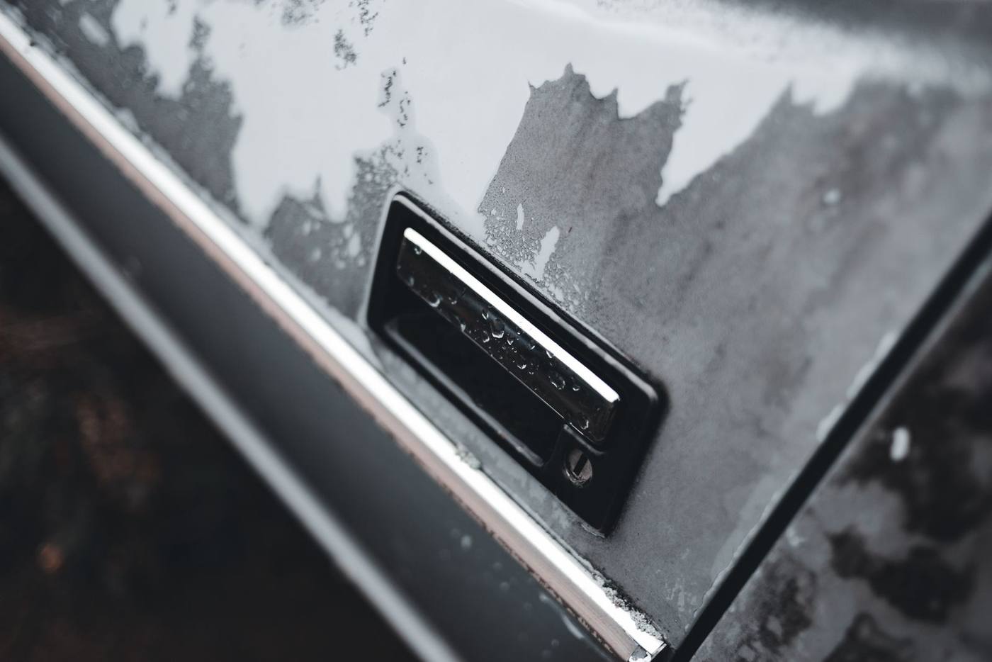 Faded Trim — black plastic restoration, before